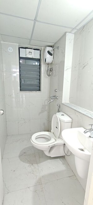 Bathroom in 2 BHK Apartment at Runwal Gardens, Dombivli East – for Rent