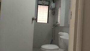Bathroom in 1.5 BHK Apartment at Runwal Gardens, Dombivli East – for Rent