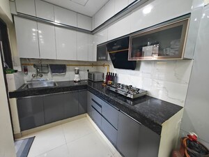 Kitchen in 2 BHK Apartment at Adore Samriddhi, Sector 89 – for Sale