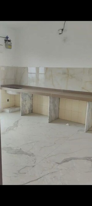 Kitchen in 3 BHK Apartment at RNA NG Royal Heights, Andheri West – for Rent