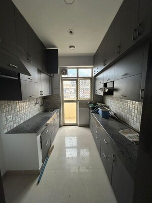 Kitchen in 2 BHK Apartment at KM Residency, Raj Nagar Extension – for Sale