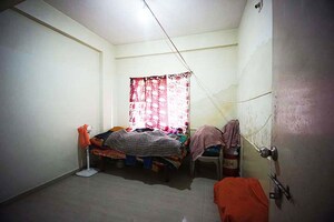 Living Room in 2 BHK Apartment at Narol – for Sale