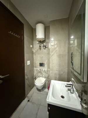 Bathroom in 2 BHK Builder Floor at Lajpat Nagar – for Sale