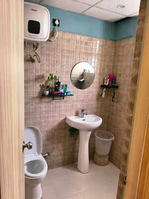 Bathroom in 3 BHK Apartment at Rishita Manhattan, Gomti Nagar – for Rent