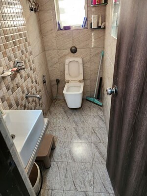 Bathroom in 2.5 BHK Apartment at DLH Orchid, Andheri West – for Sale