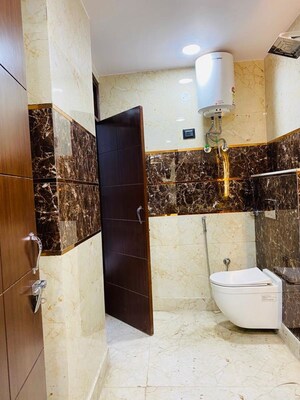 Bathroom in 2 BHK Builder Floor at Dwarka Mor – for Sale