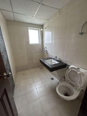 Bathroom in 3.5 BHK Apartment at Paramount Floraville, Sector 137 – for Rent