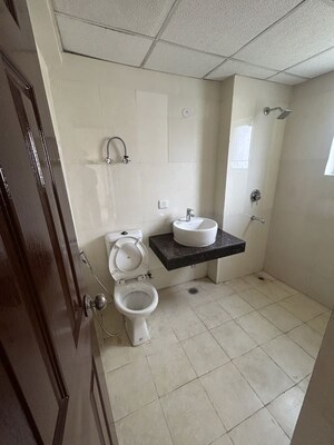 Bathroom in 3.5 BHK Apartment at Paramount Floraville, Sector 137 – for Rent