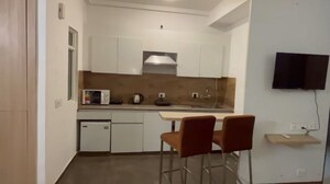 Kitchen in 2 BHK Apartment at Nimbus The Golden Palm, Sector 168 – for Sale
