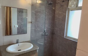 Bathroom in 2 BHK Apartment at Nimbus The Golden Palm, Sector 168 – for Sale