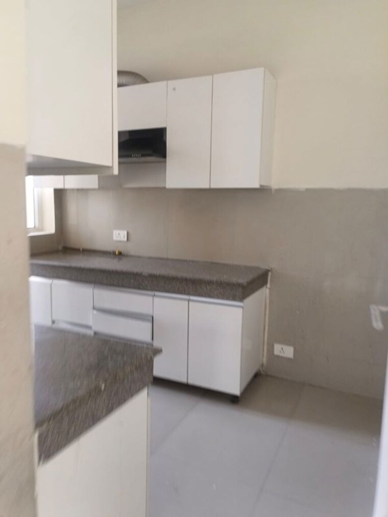 Kitchen, emaar-palm-hills 3.5 Bedroom 1450 Sq.Ft. Apartment In Sector 77 Gurgaon 10677278