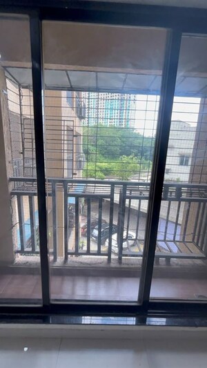 Balcony in 1 BHK Apartment at Unnati Woods CHS, Kasarvadavali – for Rent