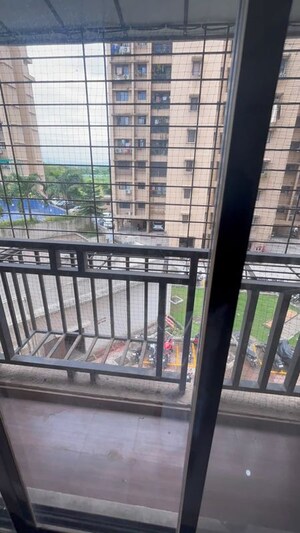 Balcony in 1 BHK Apartment at Unnati Woods CHS, Kasarvadavali – for Rent