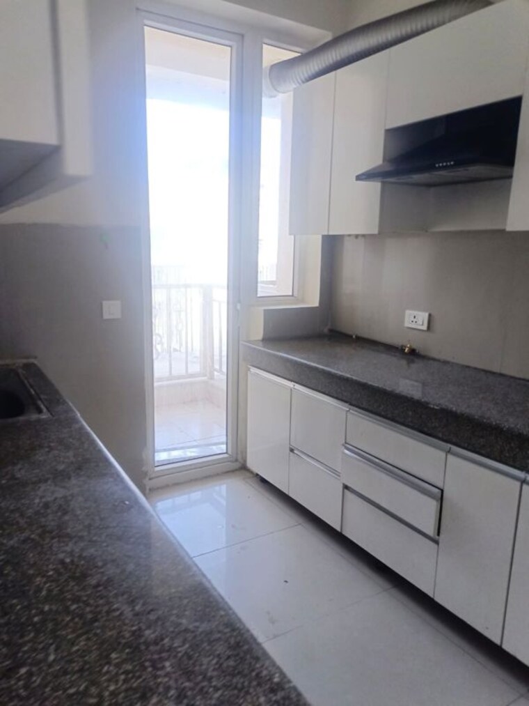 Kitchen, emaar-palm-hills 3.5 Bedroom 1450 Sq.Ft. Apartment In Sector 77 Gurgaon 10677292