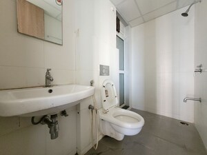 Bathroom in 3 BHK Apartment at Godrej Emerald, Ghodbunder Road – for Rent