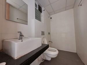 Bathroom in 3 BHK Apartment at Godrej Emerald, Ghodbunder Road – for Rent