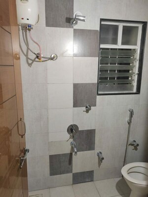 Bathroom in 2 BHK Apartment at GK Rose Icon, Pimple Saudagar – for Rent