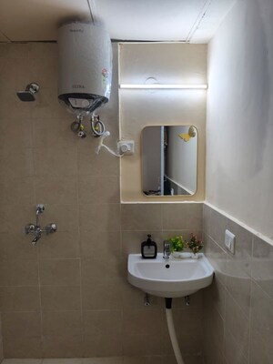 Bathroom in 3 BHK Apartment at Conscient Habitat 102, Sector 102 – for Rent