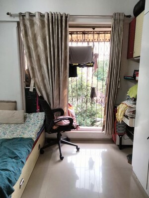 Living Room in 2 BHK Apartment at D V Shree Krishna Garden, Mira Road – for Sale
