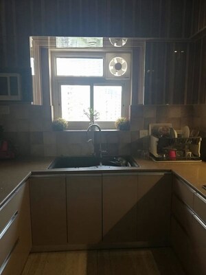 Kitchen in 3 BHK Apartment at Logix Blossom County, Sector 137 – for Sale