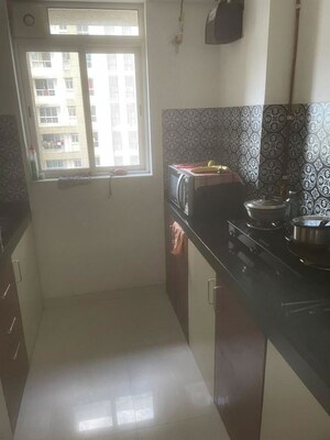 Kitchen in 1 BHK Apartment at Lodha Amara, Kolshet Road – for Rent