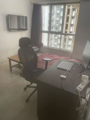 Team Area in 1 BHK Apartment at Lodha Amara, Kolshet Road – for Rent