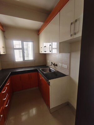 Kitchen in 2 BHK Apartment at VVIP Addresses, Raj Nagar Extension – for Rent