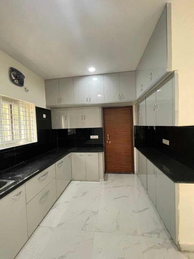 Kitchen, western-springs 3 Bedroom 2420 Sq.Ft. Apartment In Puppalaguda Hyderabad 10677623