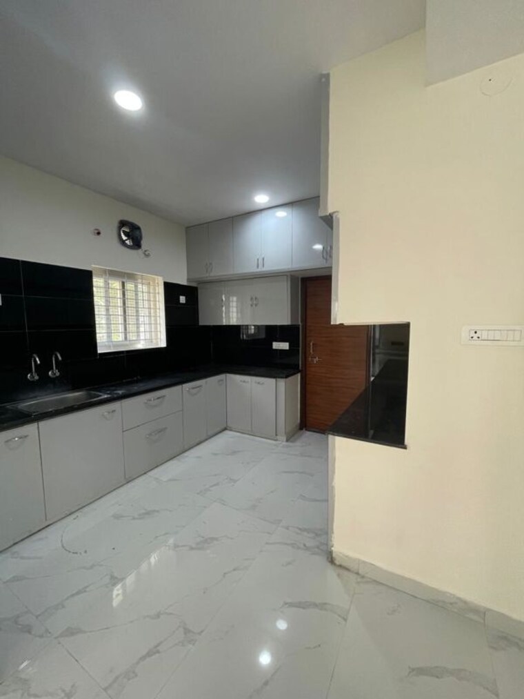 Kitchen, western-springs 3 Bedroom 2420 Sq.Ft. Apartment In Puppalaguda Hyderabad 10677623