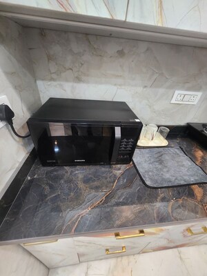 Kitchen in Studio Apartment at DLF Capital Greens Phase I And II, Moti Nagar – for Rent