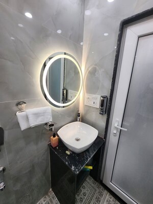 Bathroom in Studio Apartment at DLF Capital Greens Phase I And II, Moti Nagar – for Rent
