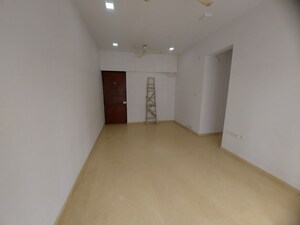 Living Room in 2 BHK Apartment at Runwal Greens, Mulund West – for Rent