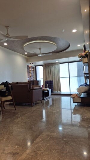 Living Room in 4 BHK Apartment at Rustomjee Paramount, Khar West – for Sale