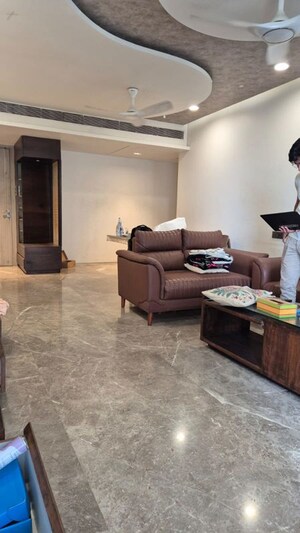 Living Room in 4 BHK Apartment at Rustomjee Paramount, Khar West – for Sale