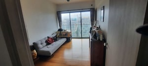 Living Room in 4 BHK Apartment at Rustomjee Paramount, Khar West – for Sale