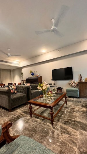 Living Room in 4 BHK Apartment at Rustomjee Paramount, Khar West – for Sale