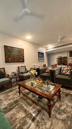 Living Room in 4 BHK Apartment at Rustomjee Paramount, Khar West – for Sale