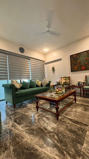 Living Room in 4 BHK Apartment at Rustomjee Paramount, Khar West – for Sale