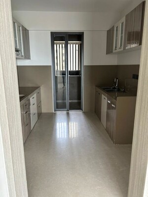 Kitchen in 4 BHK Apartment at Rustomjee Paramount, Khar West – for Sale