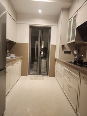 Kitchen in 4 BHK Apartment at Rustomjee Paramount, Khar West – for Sale