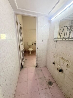 Bathroom in 3 BHK Apartment at Vikas Puri – for Rent