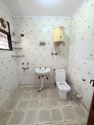 Bathroom in 3 BHK Apartment at Vikas Puri – for Rent