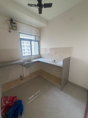 Kitchen in 1 BHK Apartment at Piramal Vaikunth, Balkum Pada – for Rent