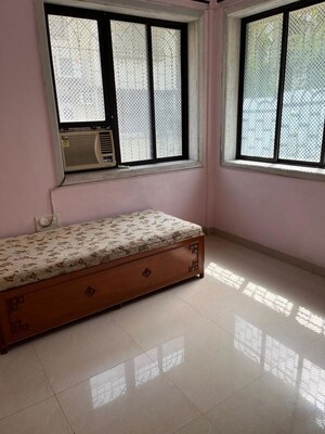 Bedroom in 2 BHK Apartment at Kataria Colony, Dadar West – for Rent