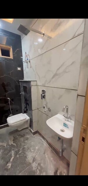 Bathroom in 2 BHK Builder Floor at Dwarka Mor – for Sale