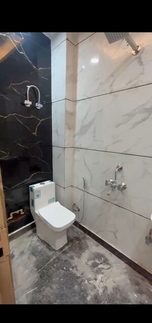 Bathroom in 2 BHK Builder Floor at Dwarka Mor – for Sale