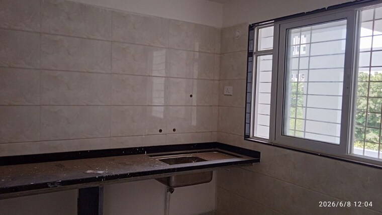 Kitchen, vastushodh-cavansite 2 Bedroom 697 Sq.Ft. Apartment In Warje Pune 10677808