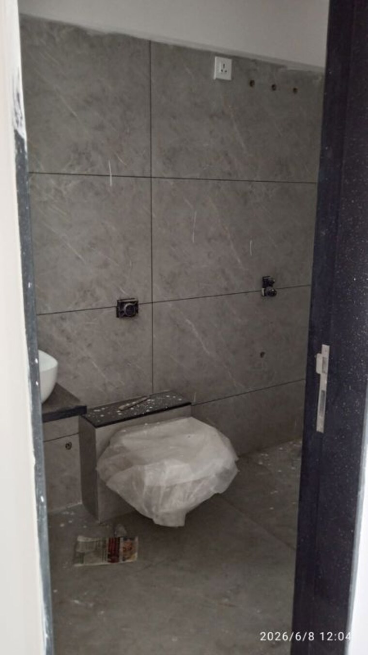 Bathroom, vastushodh-cavansite 2 Bedroom 697 Sq.Ft. Apartment In Warje Pune 10677808