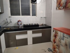 Kitchen in 1 BHK Apartment at Vastu Bassera Residency, Rahatani – for Sale