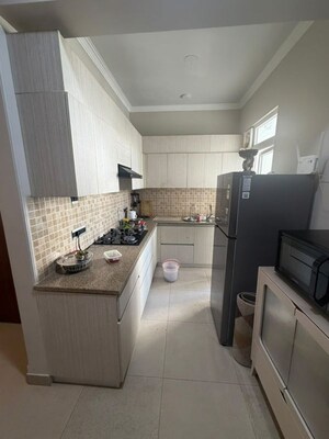 Kitchen in 2.5 BHK Apartment at Central Park Flower Valley, Sohna Sector 33 – for Rent